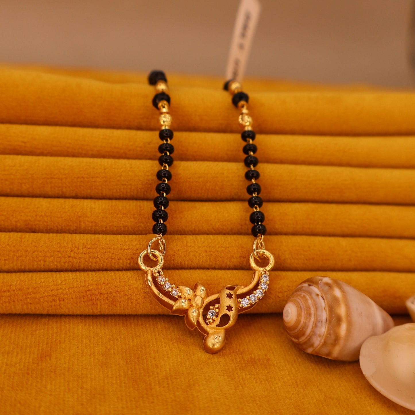 Modern Artificial Gold & AD Mangalsutra with Black Beads