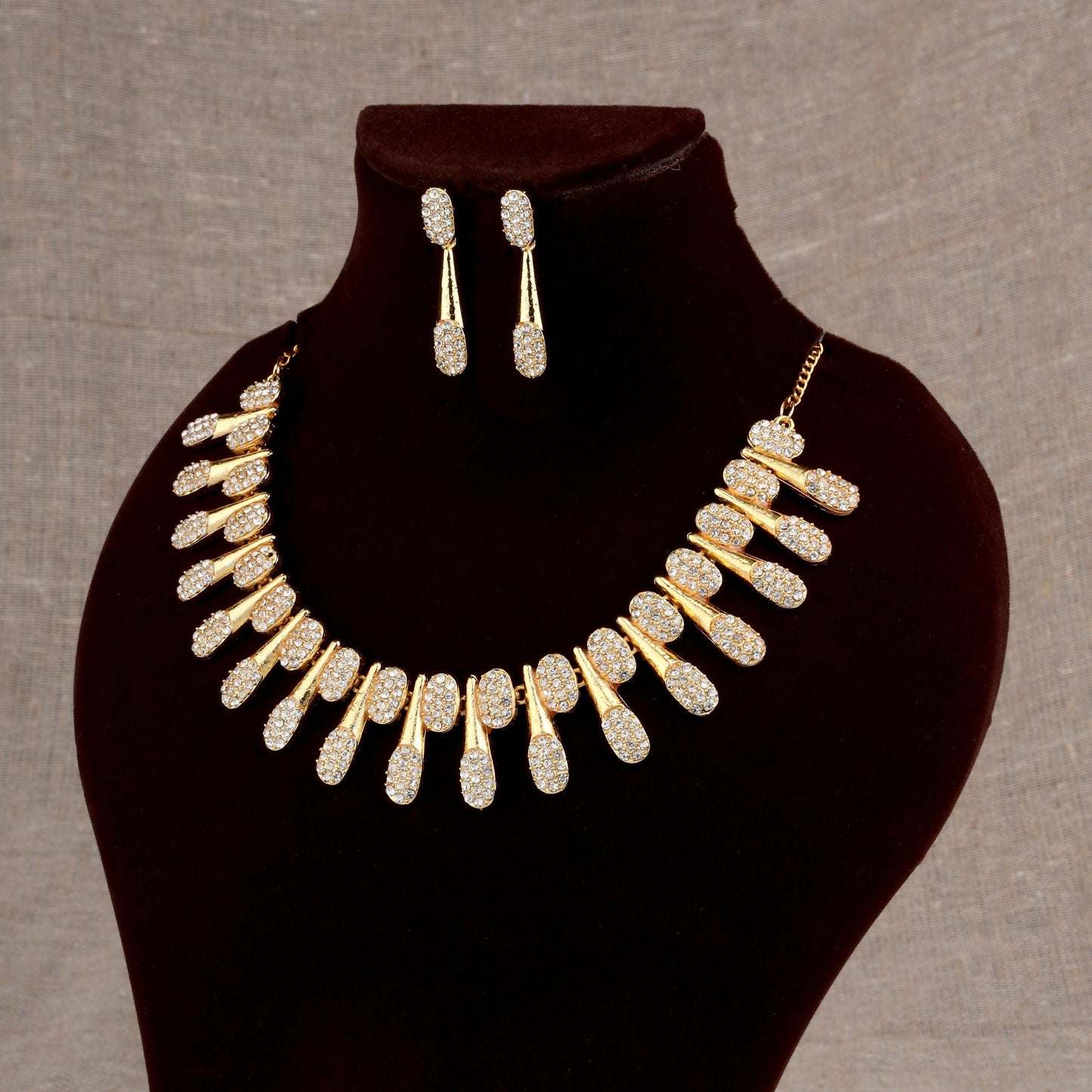 Modern Artificial Gold-Toned American Diamond Tassel Necklace Set