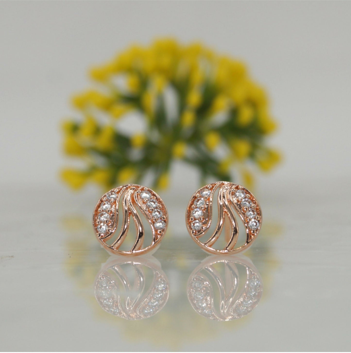 Rose Artificial Gold Swirl Stud Earrings with AD Diamonds | Elegant & Modern for women and girls