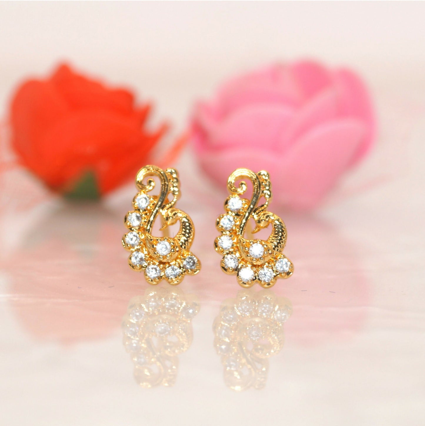 Artificial Gold Plated AD Stud Earrings | Modern S-Curve Design for women & girls