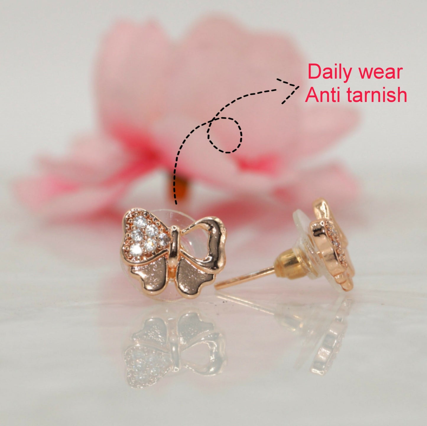 Rose    Artificial Gold Plated AD Diamond Bowknot Stud Earrings for women and girls AD for women and girls