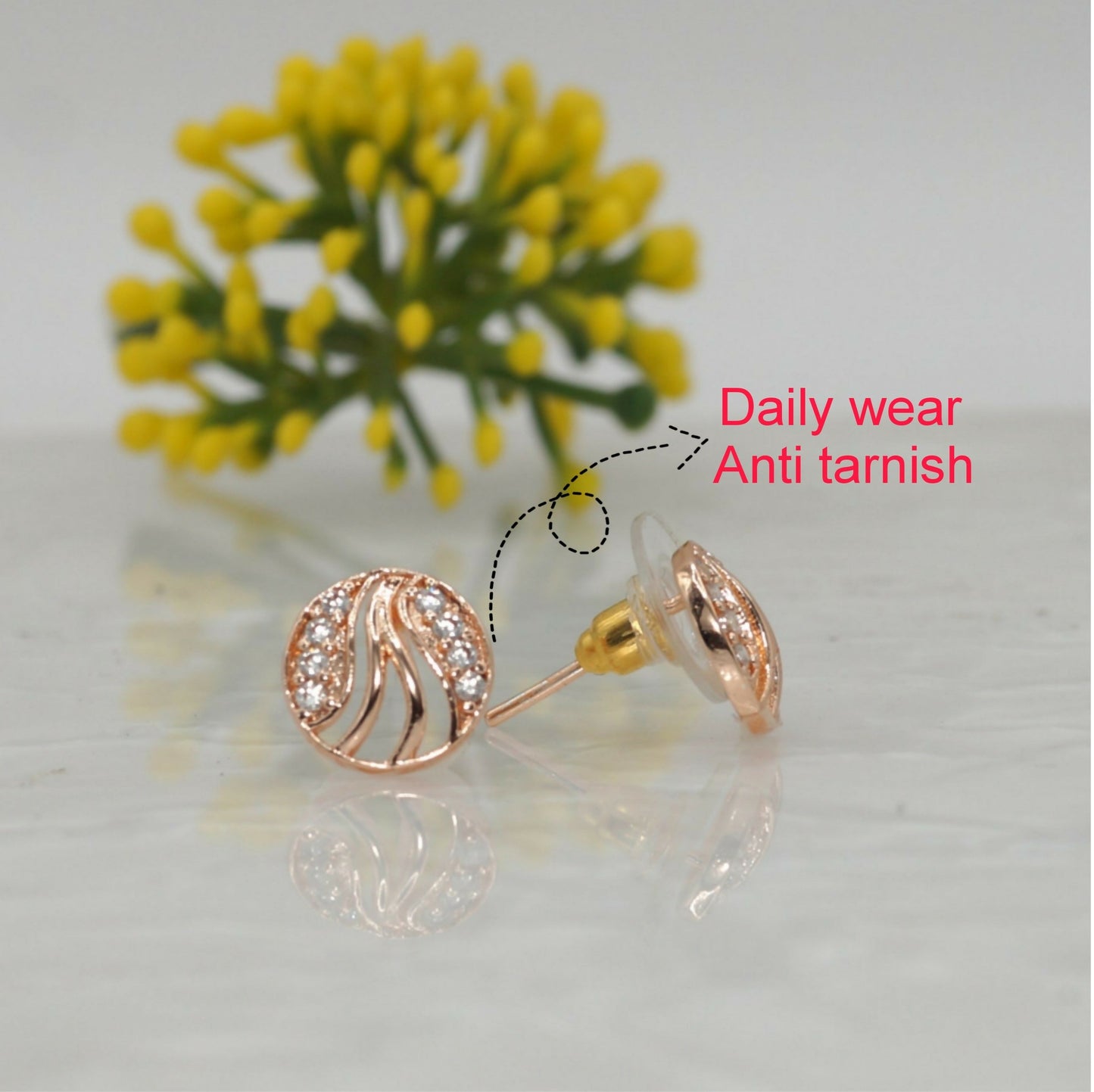 Rose    Artificial Gold Swirl Stud Earrings with AD Diamonds | Elegant & Modern for women and girls