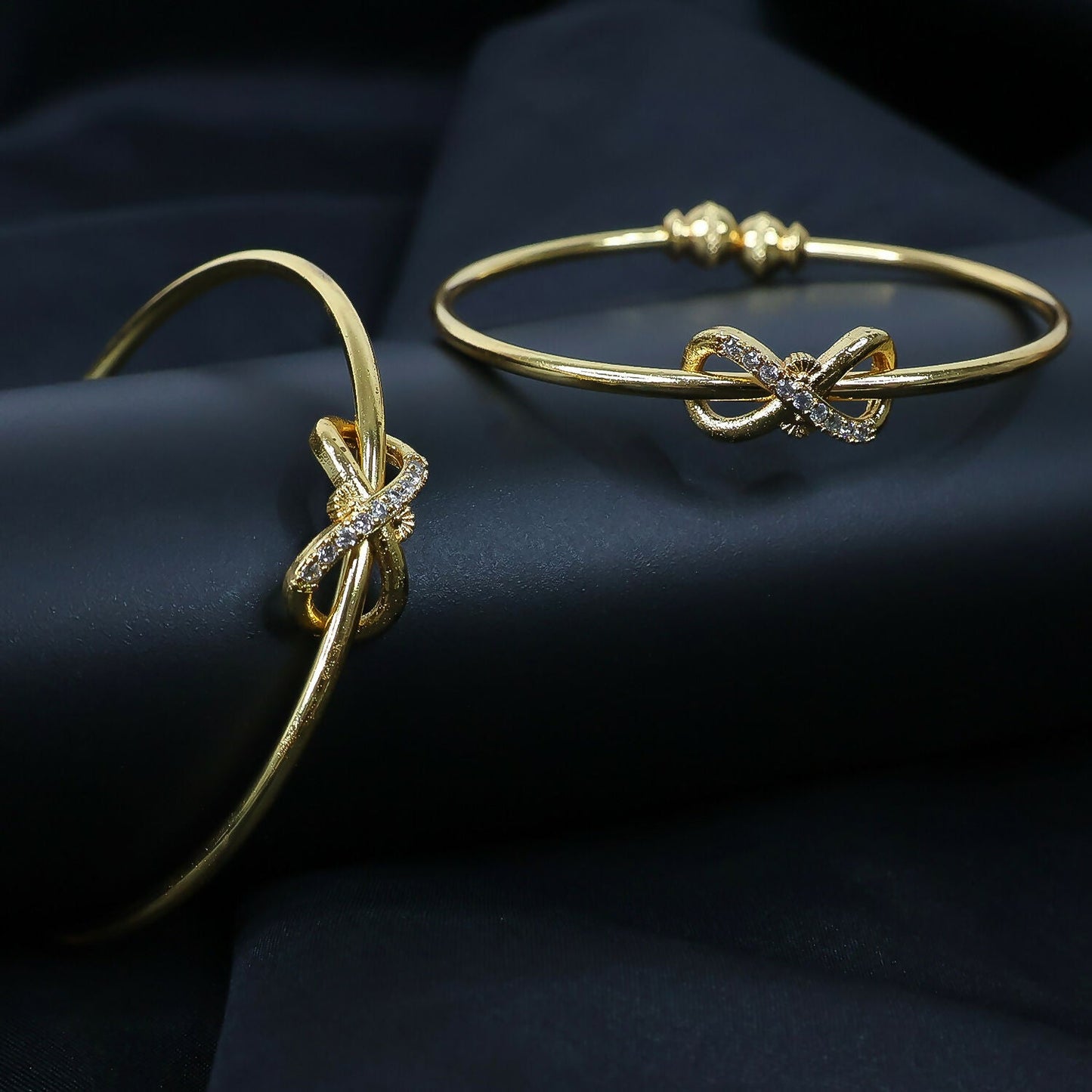 Elegant Knot Design Bangles with Stone Detailing