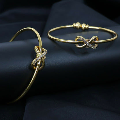 Elegant Knot Design Bangles with Stone Detailing