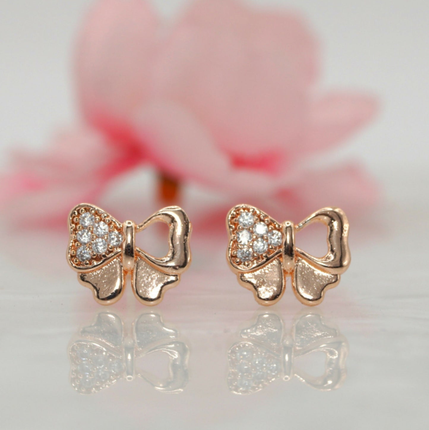 Rose    Artificial Gold Plated AD Diamond Bowknot Stud Earrings for women and girls AD for women and girls