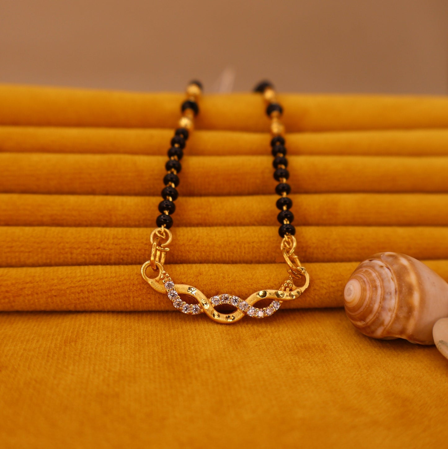 Artificial Gold Plated Infinity AD Mangalsutra with Black Beads